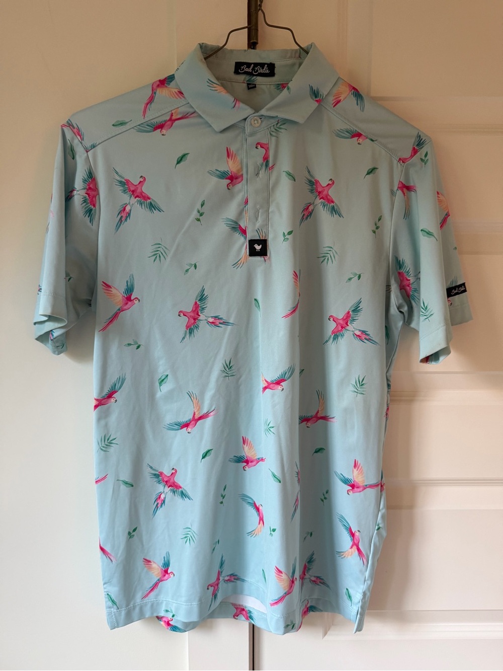 Bad Birdie Men’s Light Blue Polo with Pink & Teal Parrot Print